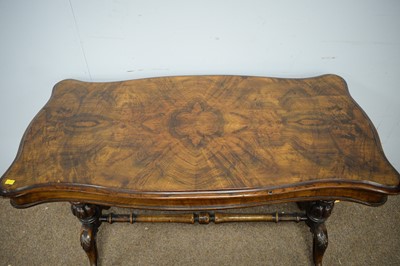 Lot 89 - A Victorian walnut reading table