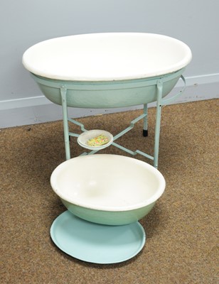 Lot 906 - A mid-20th Century oval dolls bath. / Four dolls cots/beds.