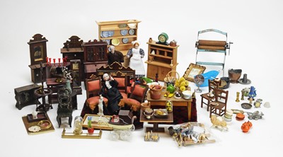 Lot 915 - A collection of antique and vintage miniature dolls, furniture and other items.