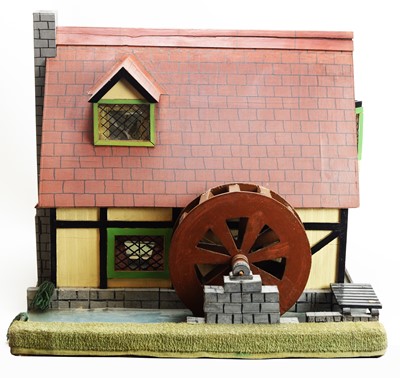 Lot 847 - A doll's mill house.