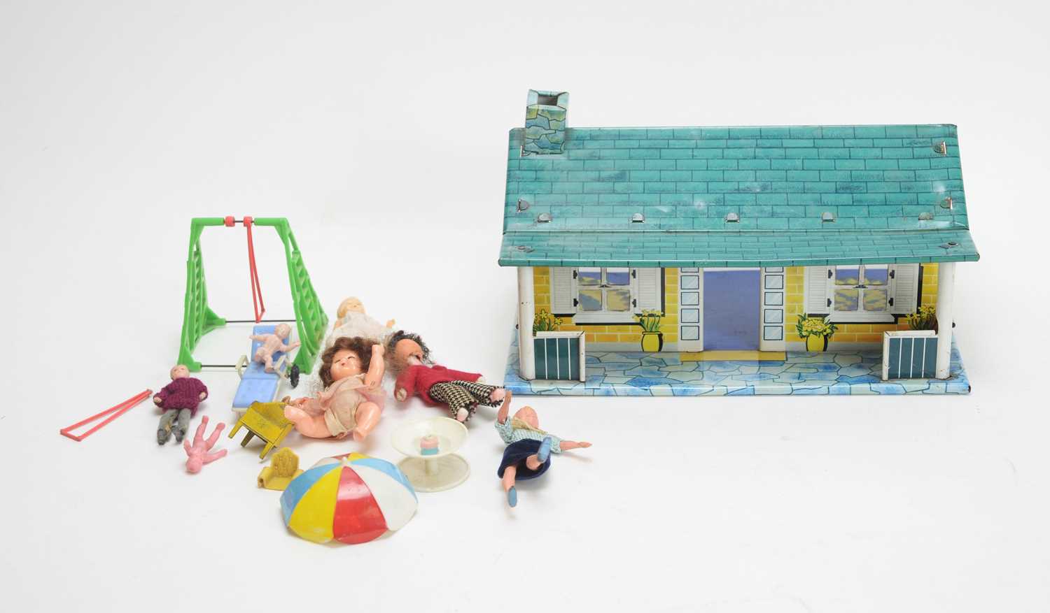 Lot 935 - A collection of antique and vintage doll's bungalow, dolls and furnishings.