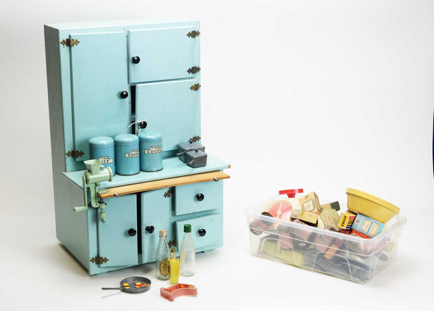 Lot 941 - Tri-ang, England: a doll's blue-painted wood kitchen dresser, and accessories.