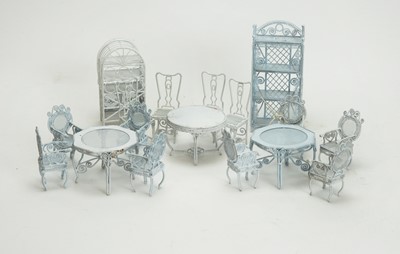 Lot 963 - Doll's miniature white-painted metal garden tables and chairs; and shelf units.