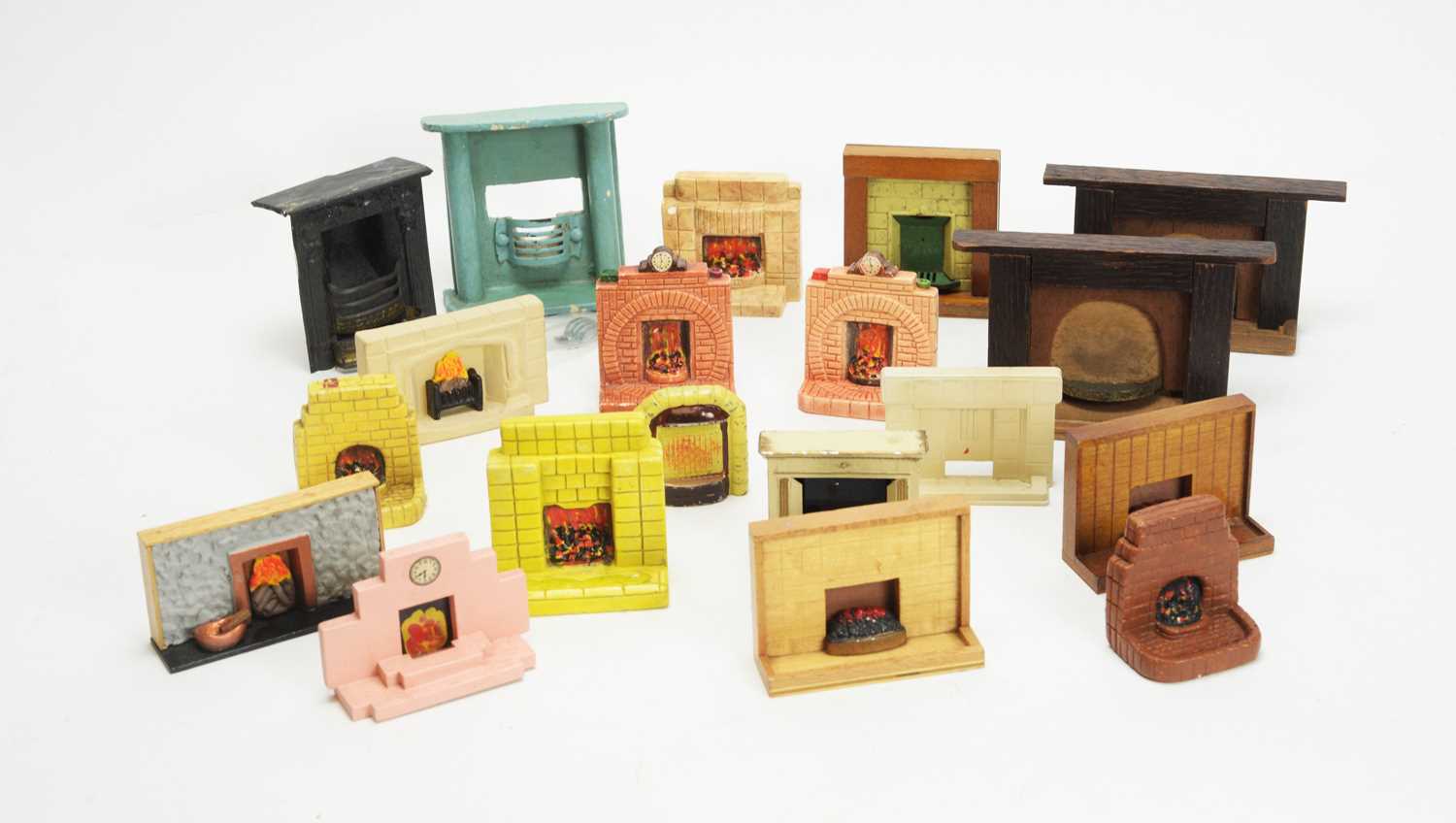 Lot 966 - Doll's house fireplaces.