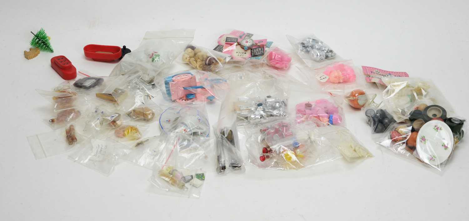 Lot 969 - Doll's tea china, plastic plates, and other accessories.