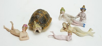 Lot 1012 - A miniature bisque pincushion doll; and five other dolls, various.