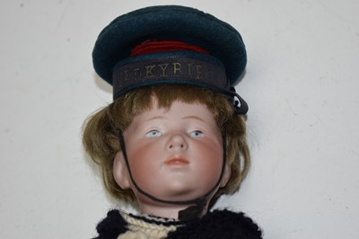 Lot 1027 - Kamer & Reinhart, Germany: a bisque head boy doll 'Peter'.