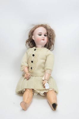 Lot 1029 - Gebruder Kuhnlenz, Germany: bisque head doll.