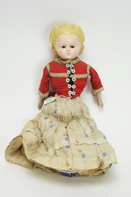 Lot 1036 - A 19th Century English wax-covered pumpkin head doll.