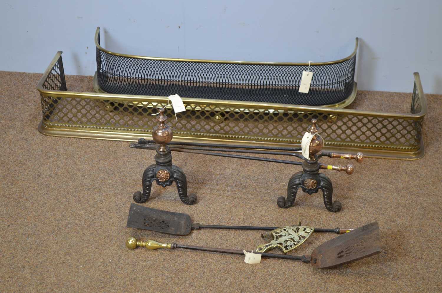 Lot 468 - Two Victorian fenders; and miscellaneous brass fireside implements.