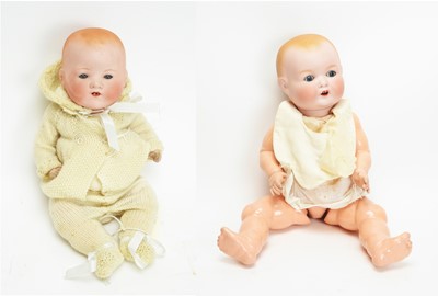 Lot 900 - Two Armand Marseille bisque head dolls.