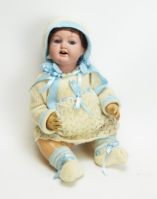 Lot 1063 - The Diamond Pottery Co., Hanley, England: a bisque head doll 'No. 72-11'.