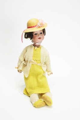 Lot 875 - A bisque head doll