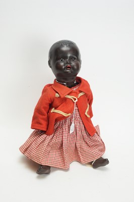 Lot 1066 - A German composition black character doll.