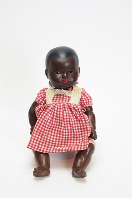 Lot 1068 - Armand Marseille, Germany: a bisque head black character doll 'No. 341'.