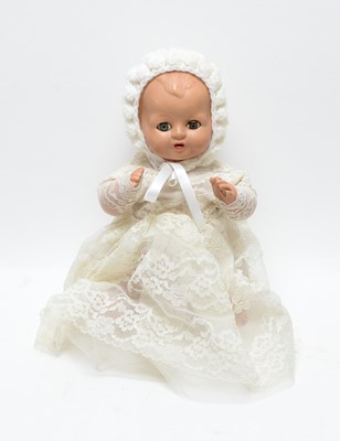 Lot 1086 - Plastex, England: a composition character doll.