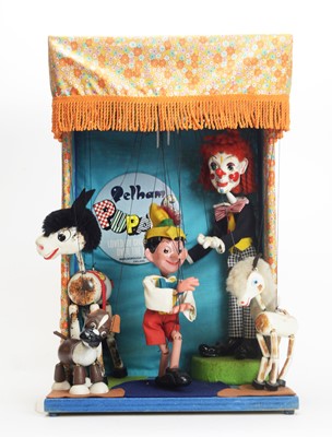 Lot 1130 - Pelham: a toyshop display puppet theatre.