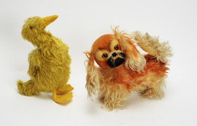 Lot 1098 - A toy Pekinese dog in mohair; and 20th C duck.