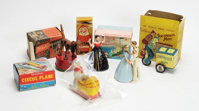 Lot 1143 - A Permoid tinplate clockwork ice-cream man; and various other toys.