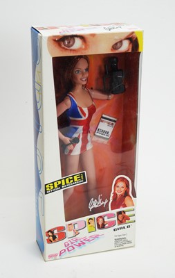 Lot 1082 - A Spice Girls "Geri Halliwell" personality doll.