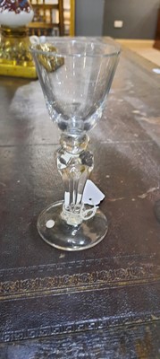 Lot 649 - A round funnel wine glass.