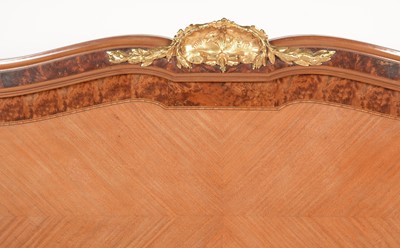 Lot 80 - Louis XVI style inlaid mahogany and amboyna double bed.