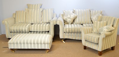 Lot 449 - Sofa and matching pouffe; similar sofa; and an armchair.