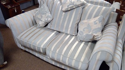 Lot 449 - Sofa and matching pouffe; similar sofa; and an armchair.