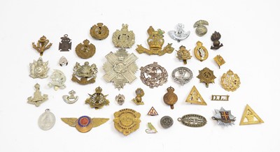 Lot 726 - Collection of military cap badges and others