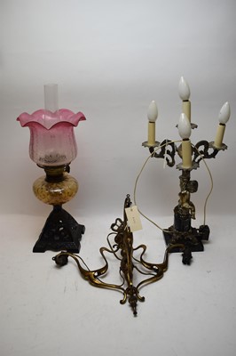 Lot 375 - An oil lamp; chandelier; and table lamp.