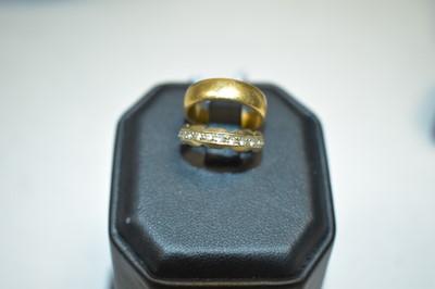 Lot 97 - 22ct gold ring and an eternity ring