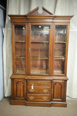 Lot 211 - A modern mahogany display cabinet.