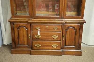 Lot 211 - A modern mahogany display cabinet.