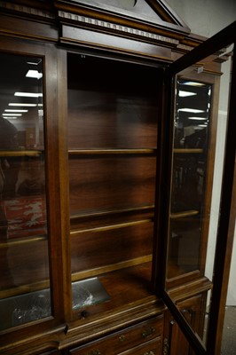 Lot 211 - A modern mahogany display cabinet.