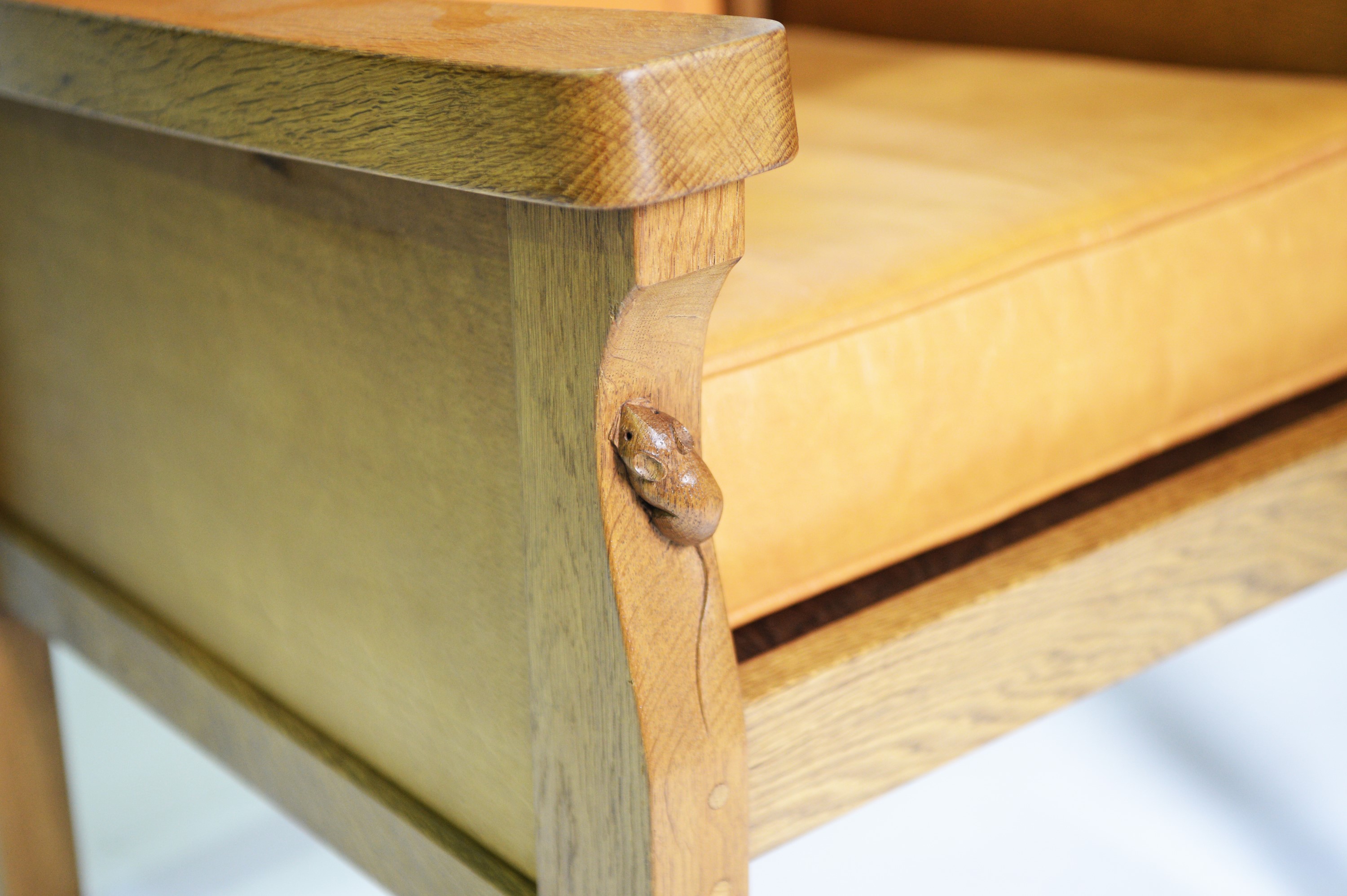 Lot 105 Robert 'Mouseman' Thompson oak armchair.