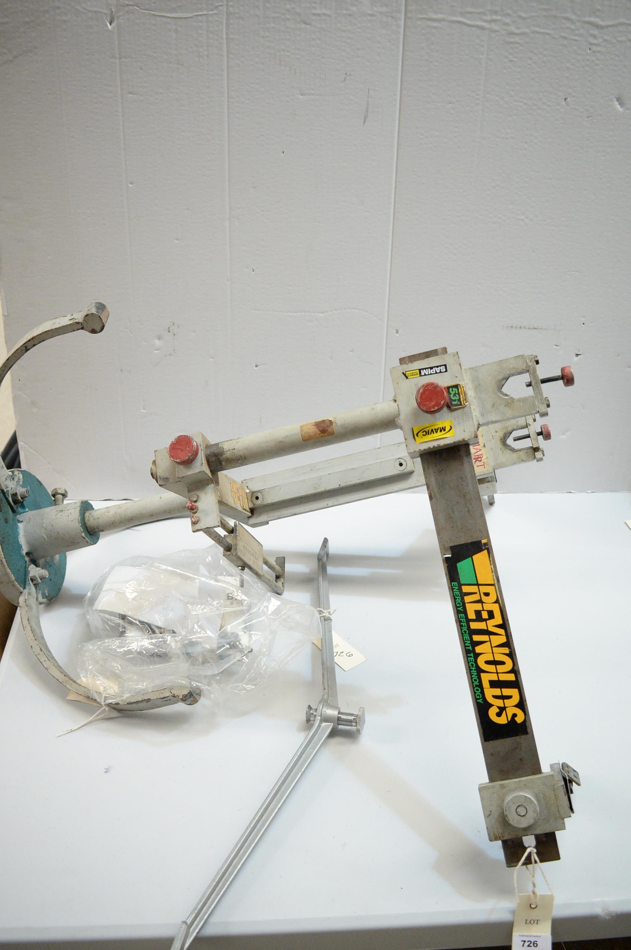 Lot 726 A bicycle wheel builders jig.