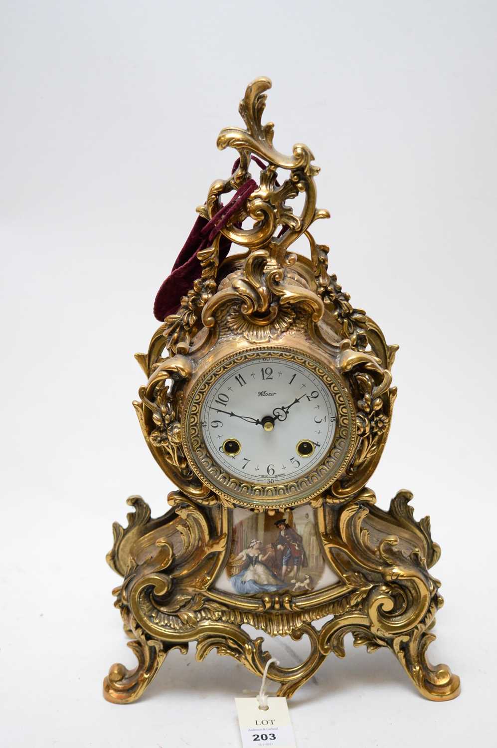 Lot 203 - A modern French style Mozer mantel clock.