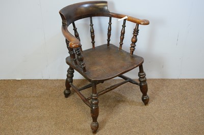 Lot 89 - Late Victorian captain's chair.