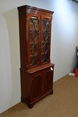 Lot 111 - A reproduction mahogany bookcase