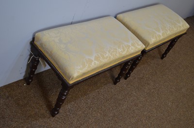 Lot 28 - Pary of Regency-style stained wood stools.