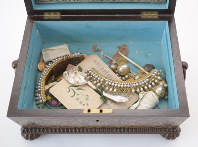 Lot 787 - A Regency brass inlaid rosewood work box.