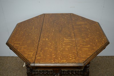 Lot 98 - Late Victorian octagonal oak centre table.
