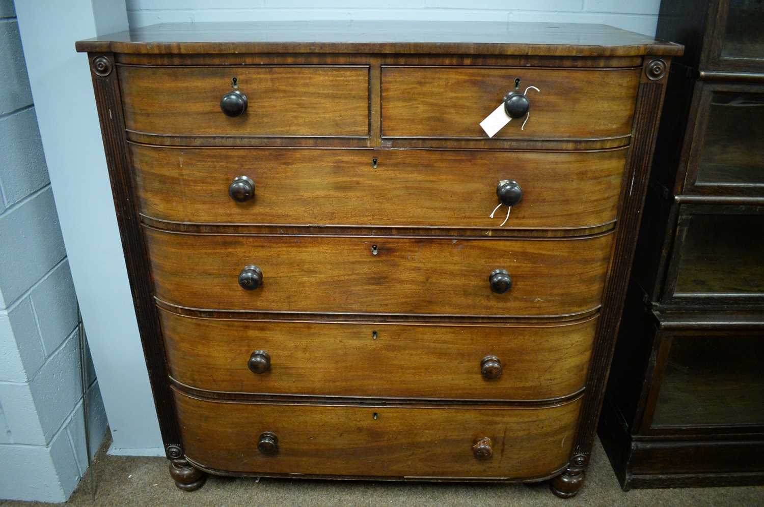 Lot 123 - Early 19th C bowfront chest of drawers.