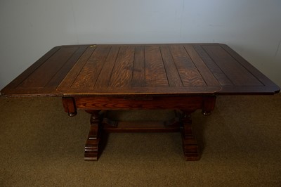 Lot 86 - 1930's Lees-style carved oak dining table.