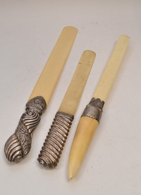 Lot 43 - Three silver mounted ivory page turners
