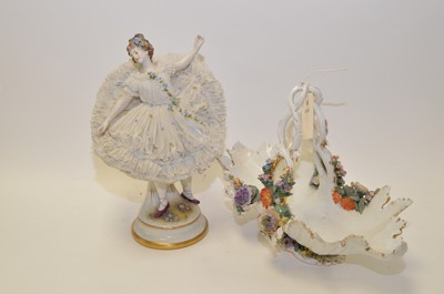 Lot 260 - A Continental figurine and a basket