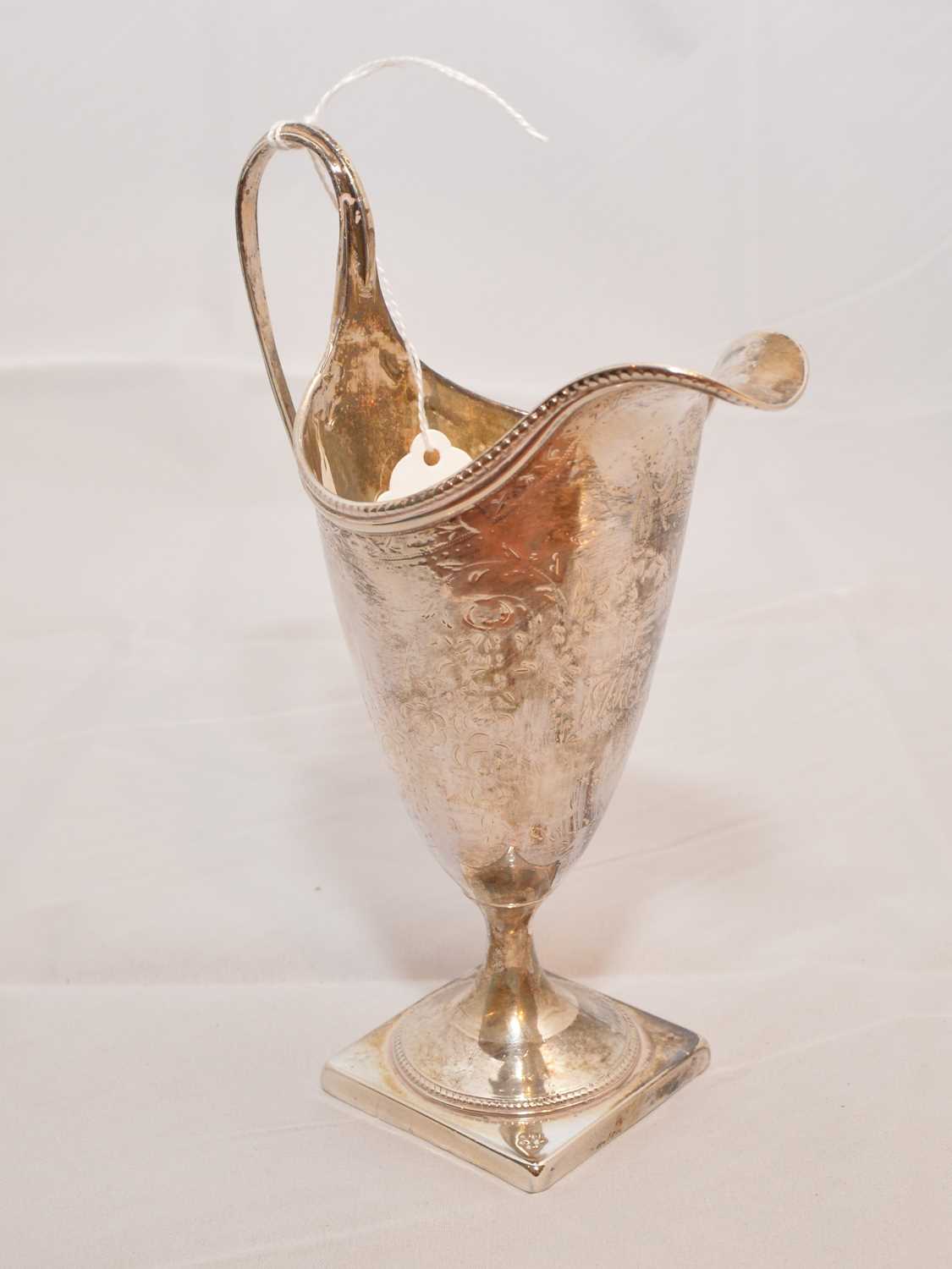 Lot 67 - A George III silver cream jug by Henry Chawner