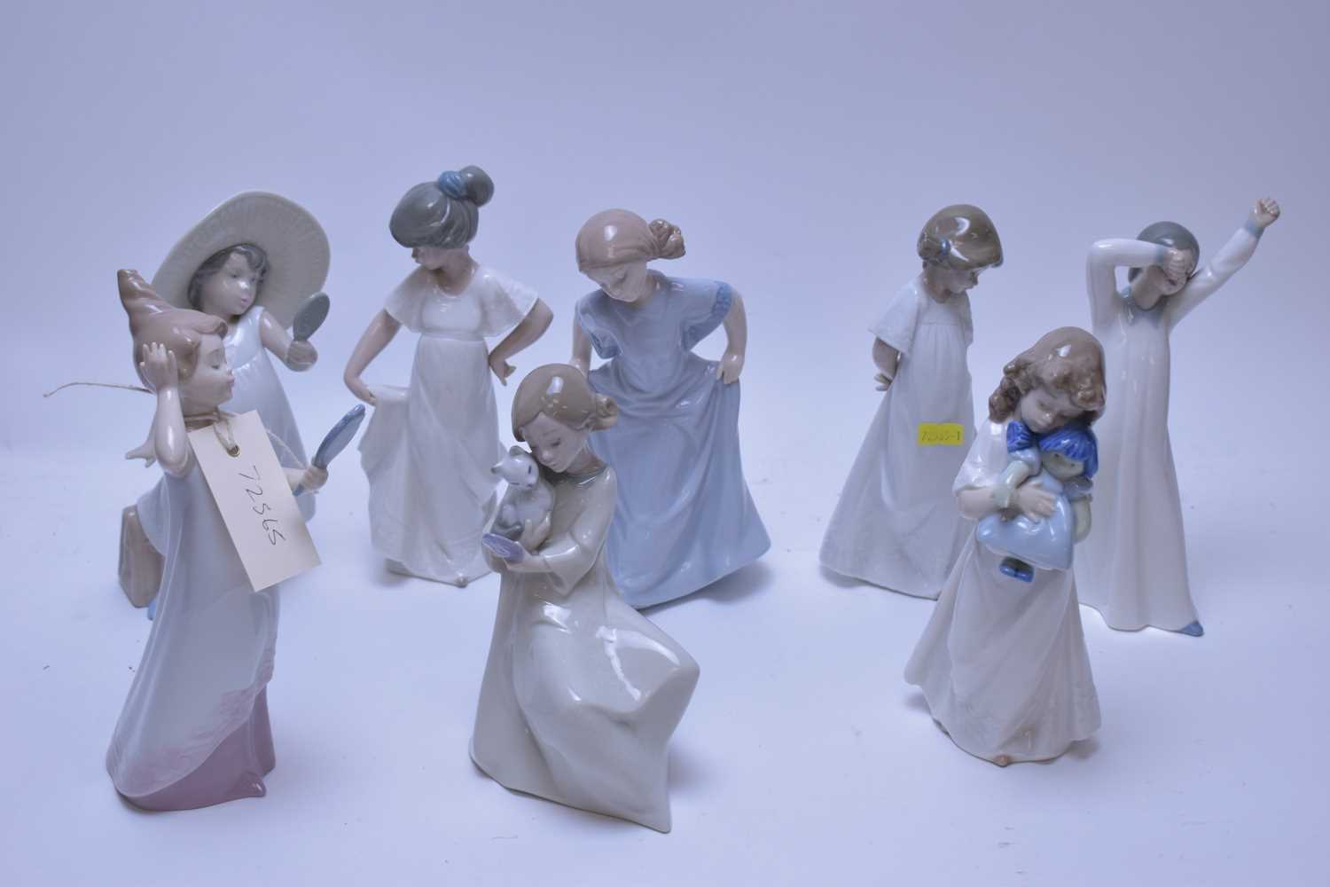 Lot 168 - Eight assorted Nao figurines.