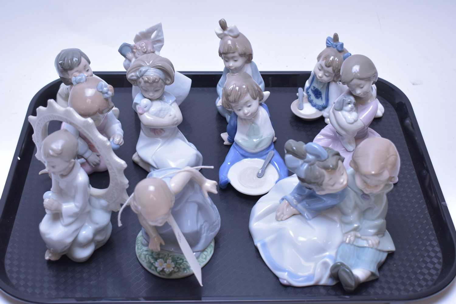Lot 213 - Eleven Nao figurines.