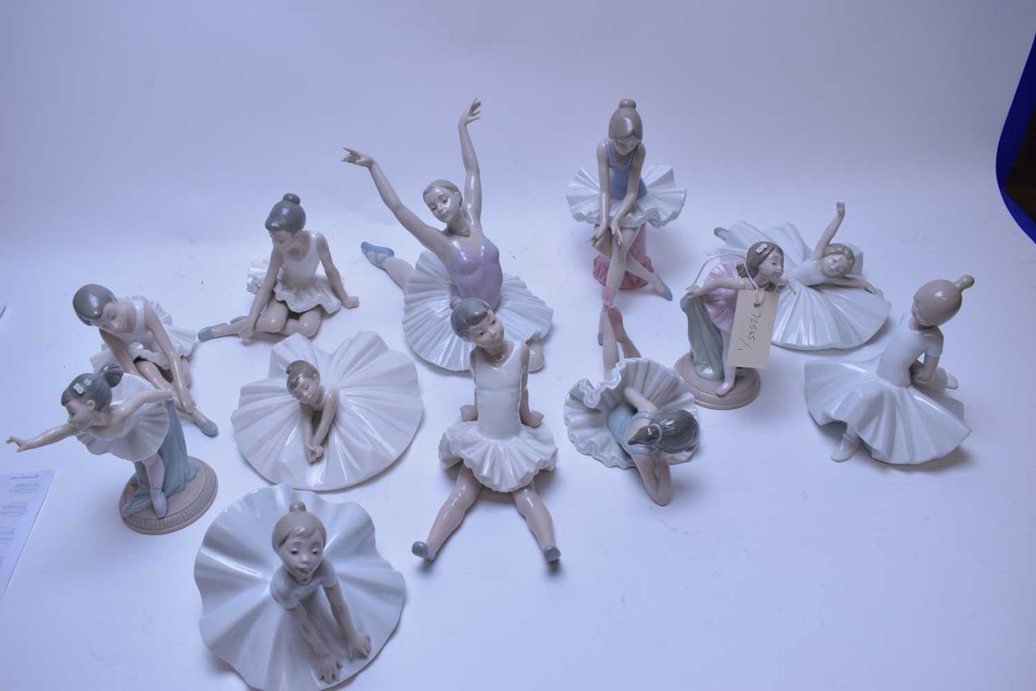Lot 234 - Twelve Nao ballerina figurines.